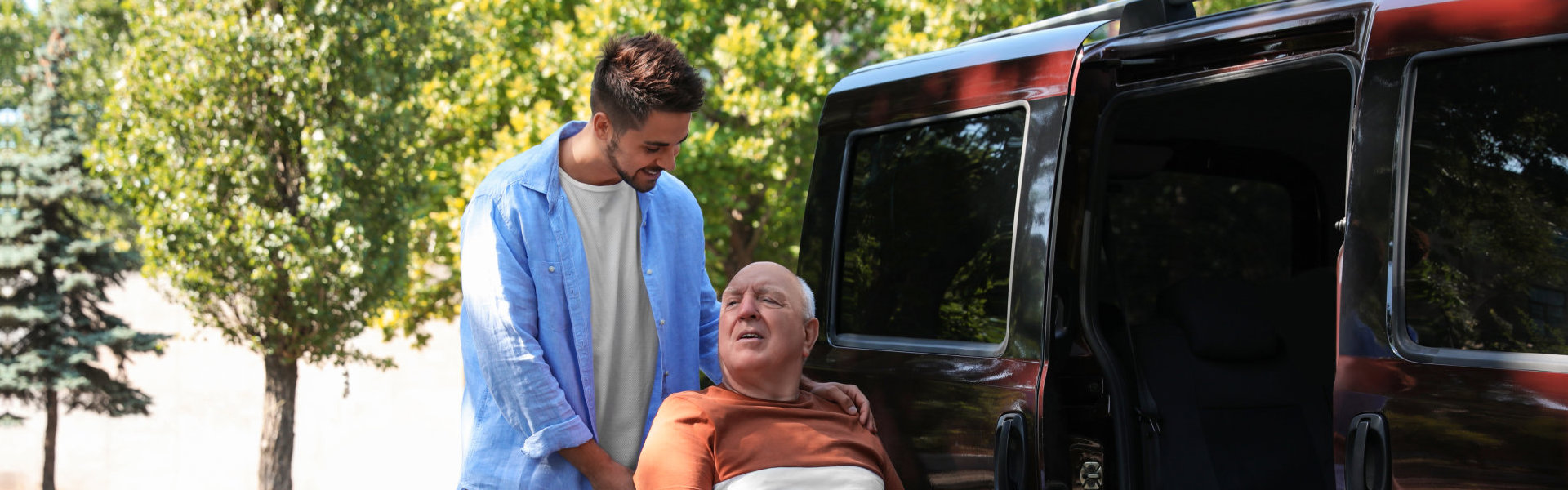 caregiver and elderly going in the van